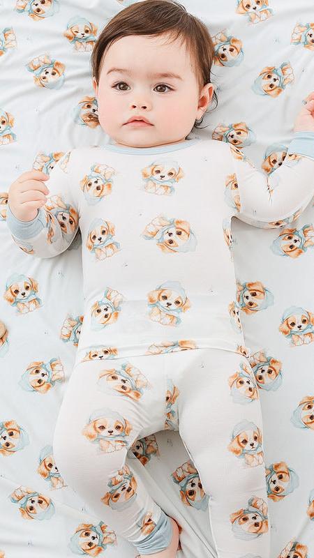 Adorable baby and toddler clothing by Isla + Bo featuring comfortable, breathable, and machine washable outfits. Includes bamboo sleepers, cotton knit sets, classic denim dresses, and more in a variety of styles and prints like floral, plaid, and animal designs.